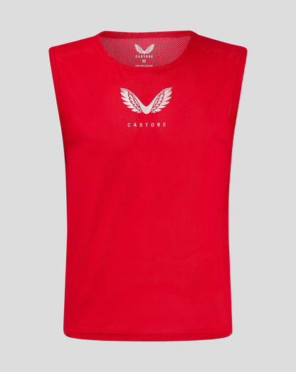 Red unisex training bib with scoop neckline mesh and white Castore logo on the front