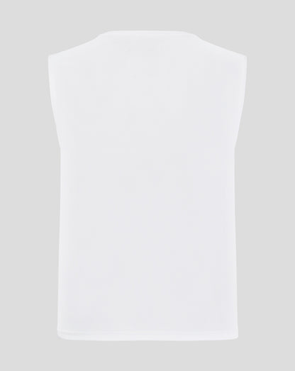 Back view of white mesh training bib with curved shoulders and perforated fabric
