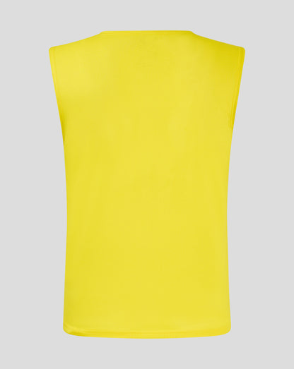 Back view of bright yellow junior training bib with scoop neckline and bound armholes