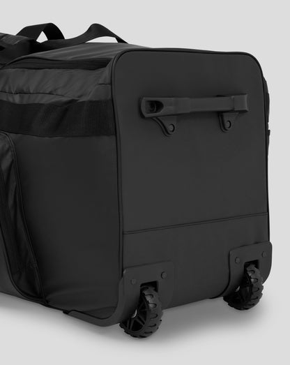Bottom corner of black Castore bag with wheel and reinforced base