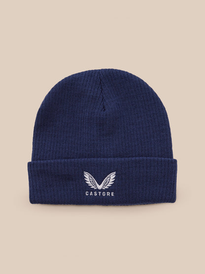 Navy knit beanie with a folded cuff and CASTORE logo