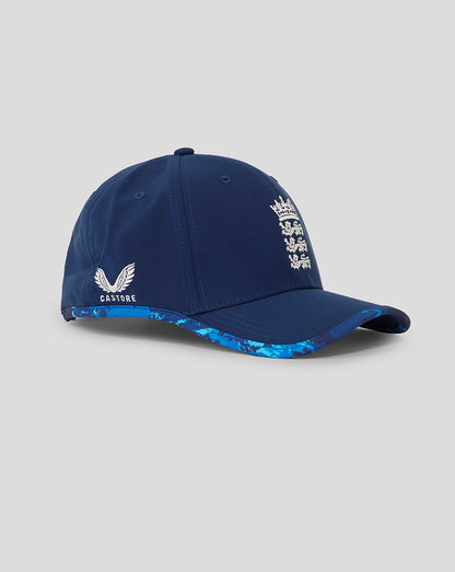 Angled side view of navy England ODI cap with Three Lions crest on front and blue camo brim