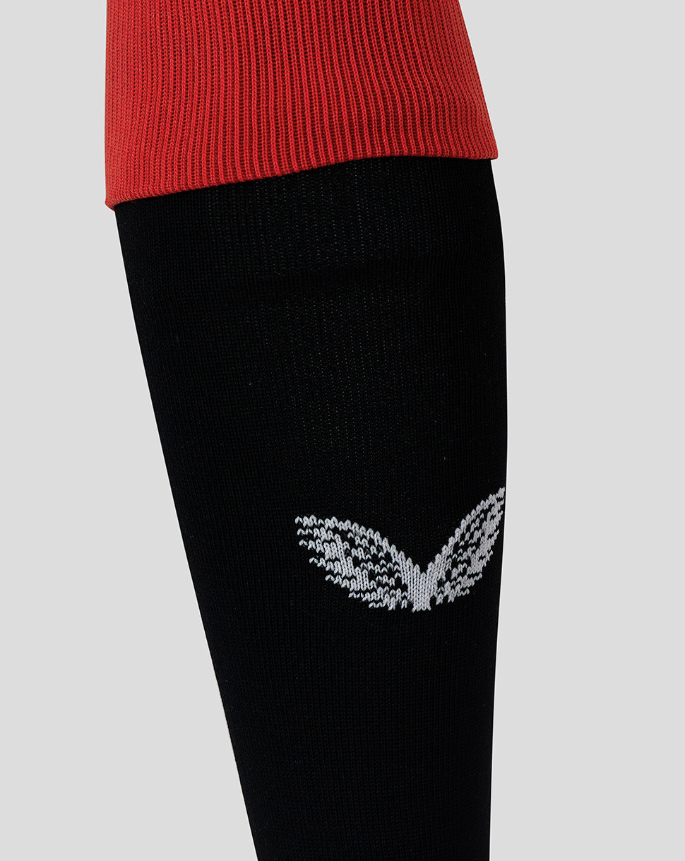 Close-up of a black Rangers sock with a white Ibrox motif on the shin and a red cuff.