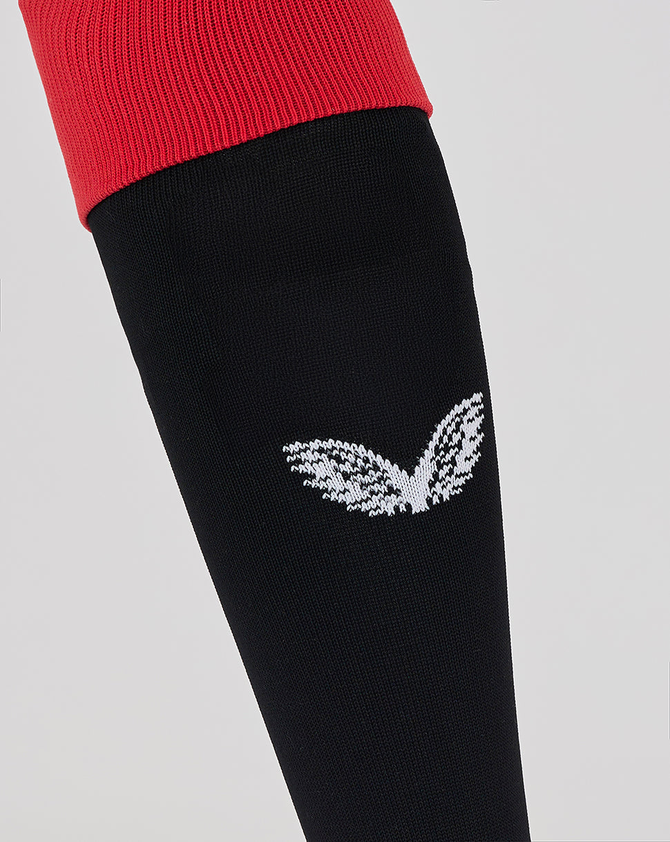 Black Rangers Ibrox 125 Heritage footless sock on leg with white embroidered motif at shin