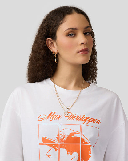Female model wearing white Max Verstappen puzzle T shirt with orange front graphic.