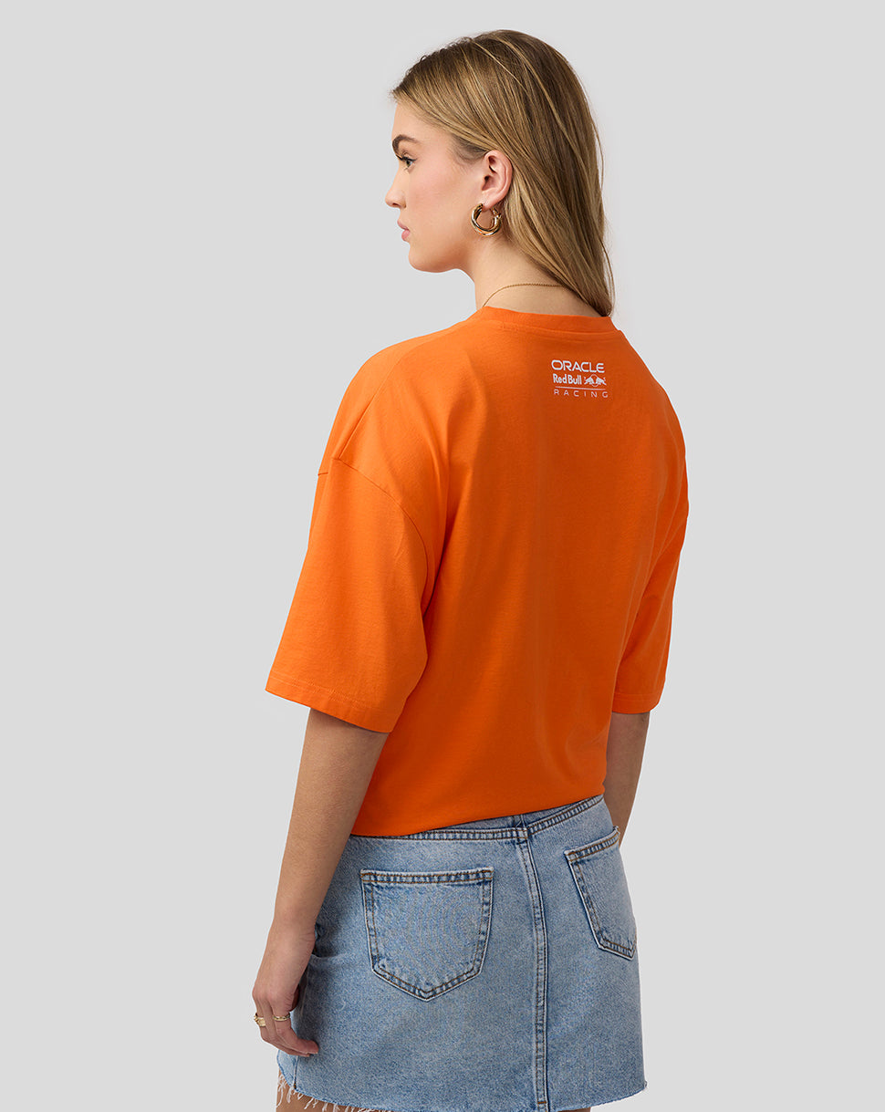 Front view of an oversized Exotic Orange Oracle Red Bull Racing T shirt featuring a Max Verstappen graphic