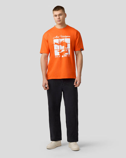 Male model wearing bright orange Oracle Red Bull Racing Max Verstappen Puzzle T shirt with a large front graphic.