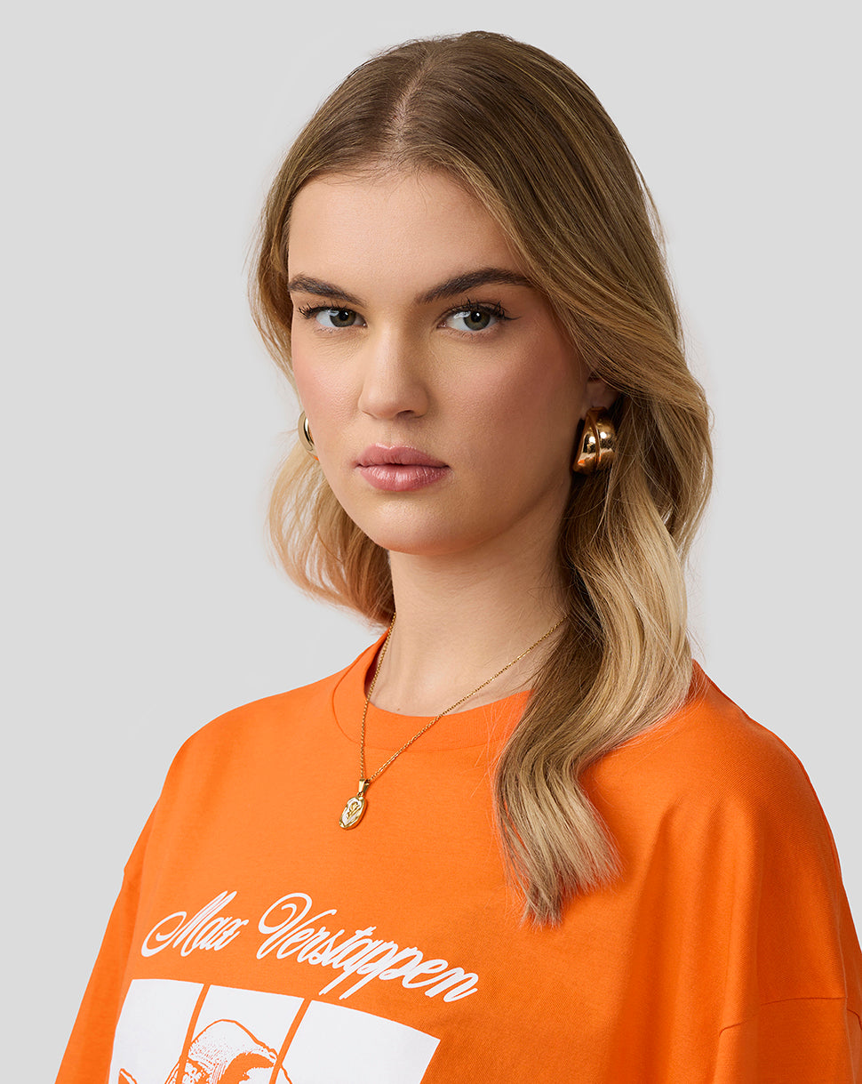 Female model wearing the Exotic Orange Oracle Red Bull Racing Max Verstappen T-shirt with large graphic