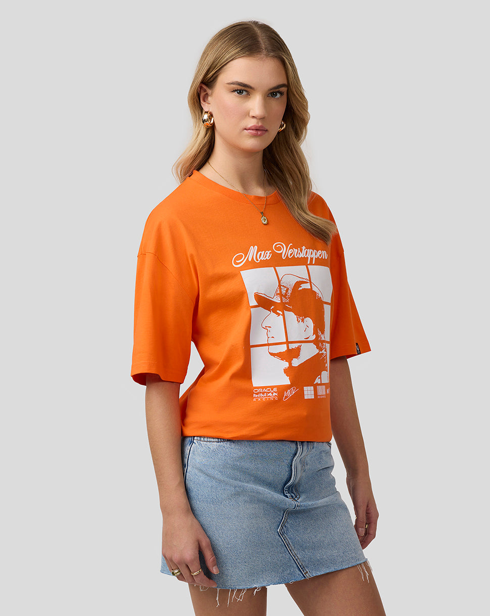 Side view of a model wearing a bright orange Max Verstappen graphic T shirt from Oracle Red Bull Racing