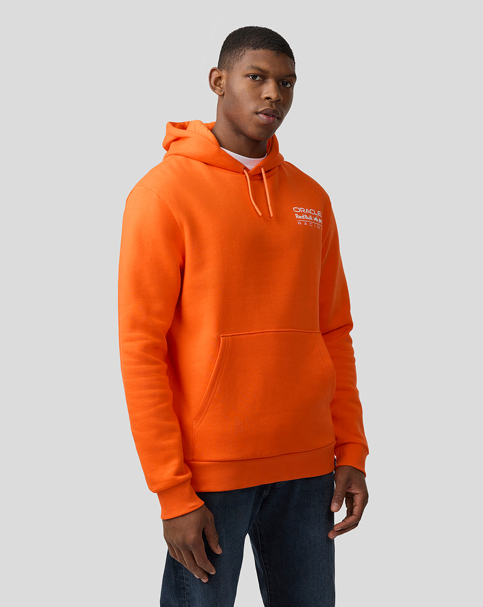Male model in bright orange Oracle Red Bull Racing hoodie with drawstring hood and front kangaroo pocket.