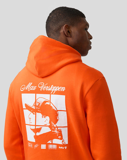 Back view of a man in a bright orange Oracle Red Bull Racing hoodie showing a large back graphic