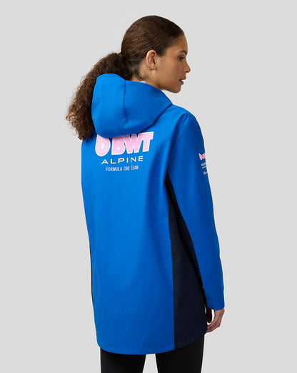Three-quarter back view of blue jacket with navy side panels and large pink BWT Alpine logo on the upper back.