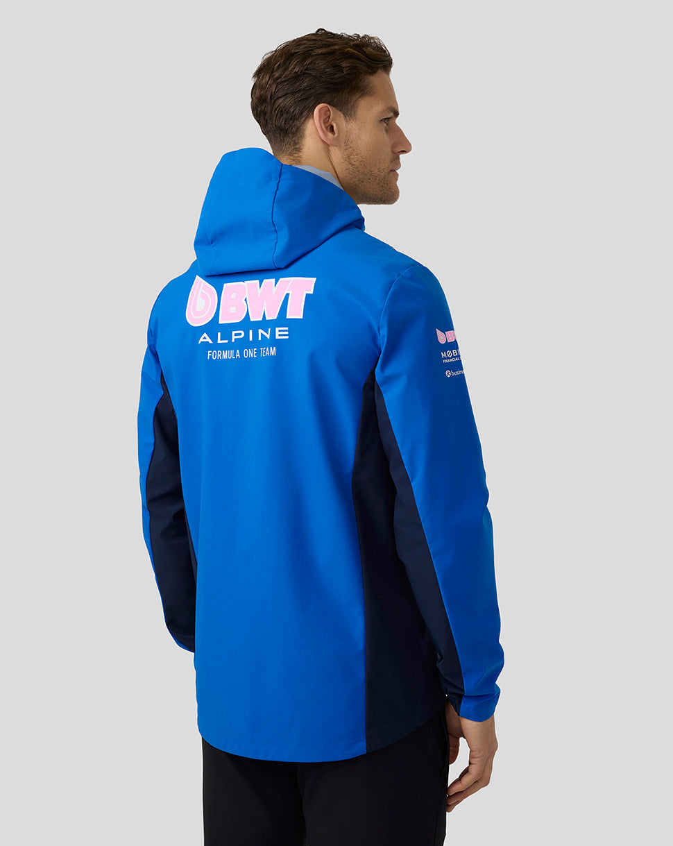 Back view of lapis blue BWT Alpine water resistant jacket with a large pink logo across the back and hood.