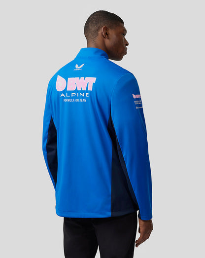 Male model from behind wearing bright blue BWT Alpine jacket with large back logo and navy side panels.