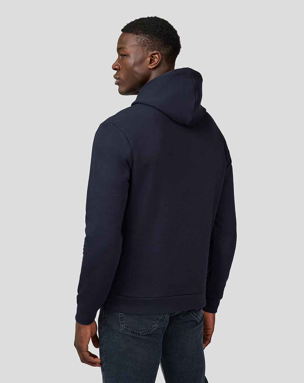 Rear view of a navy Night Sky hoodie worn by a model, showing plain back and attached hood