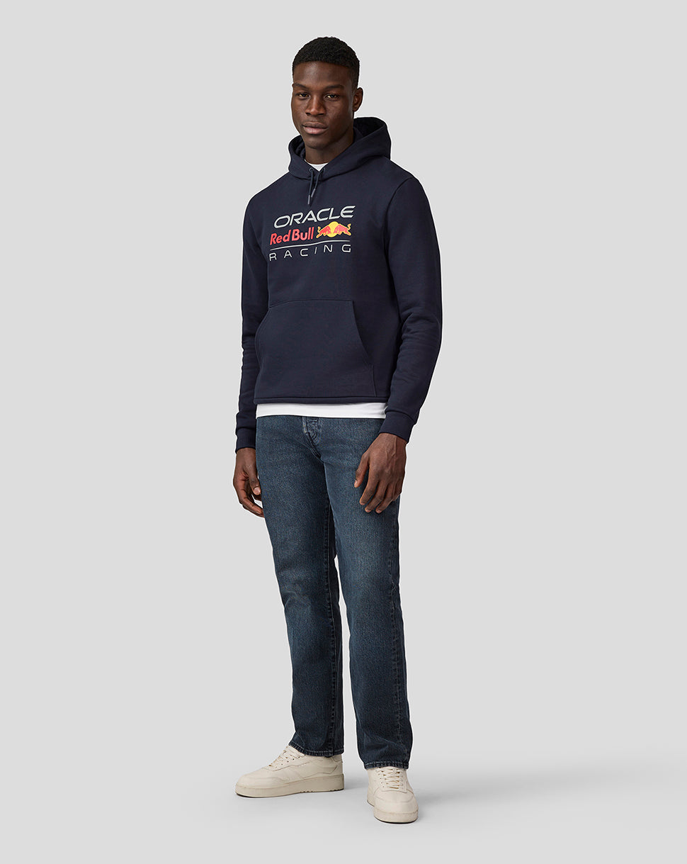 Male model in a navy Night Sky Oracle Red Bull Racing hoodie with front logo facing slightly left
