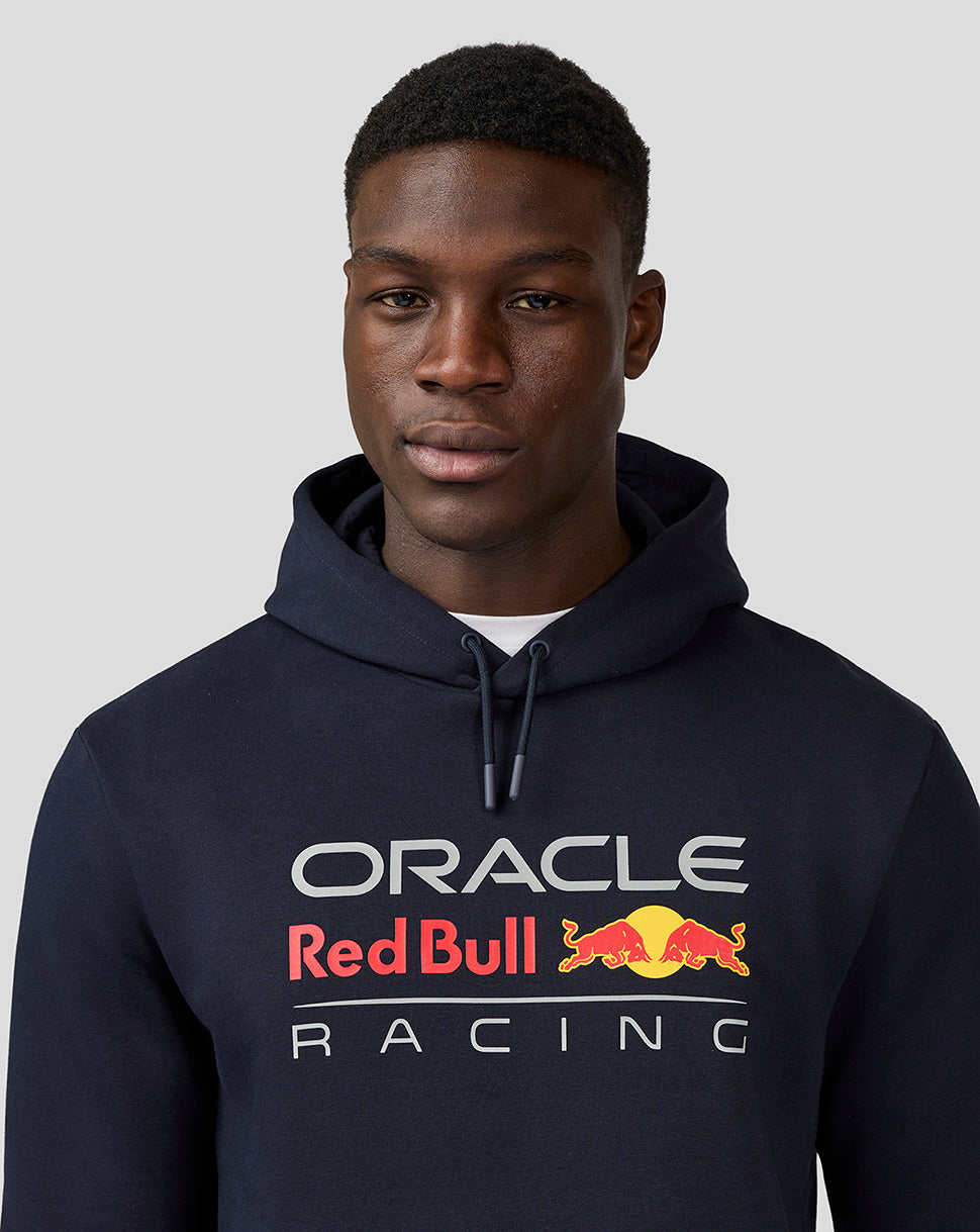 Close-up of a model in a Night Sky hoodie featuring the Oracle Red Bull Racing chest logo and adjustable drawstring hood