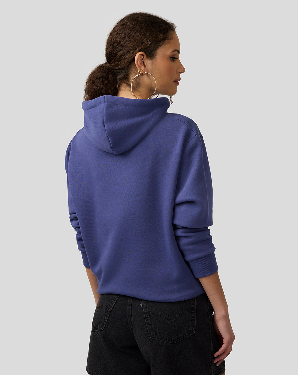 Back view of a model wearing Skipper Blue Oracle Red Bull Racing hoodie with hood up