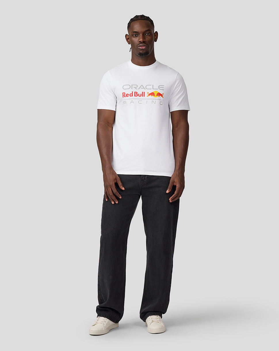 Man wearing white Oracle Red Bull Racing T shirt with a large front logo.