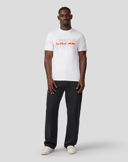 Man wearing white Oracle Red Bull Racing T shirt with a large front logo.