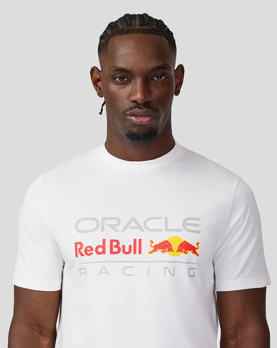 Front view of a male model wearing white Oracle Red Bull Racing T-shirt with a large logo on the chest.