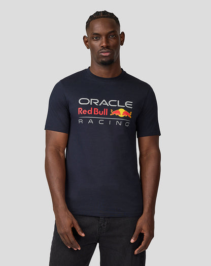 Man wearing navy blue Oracle Red Bull Racing T shirt with a large front logo.