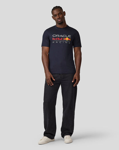 Front view of a man in navy Oracle Red Bull Racing T Shirt with large graphic on chest