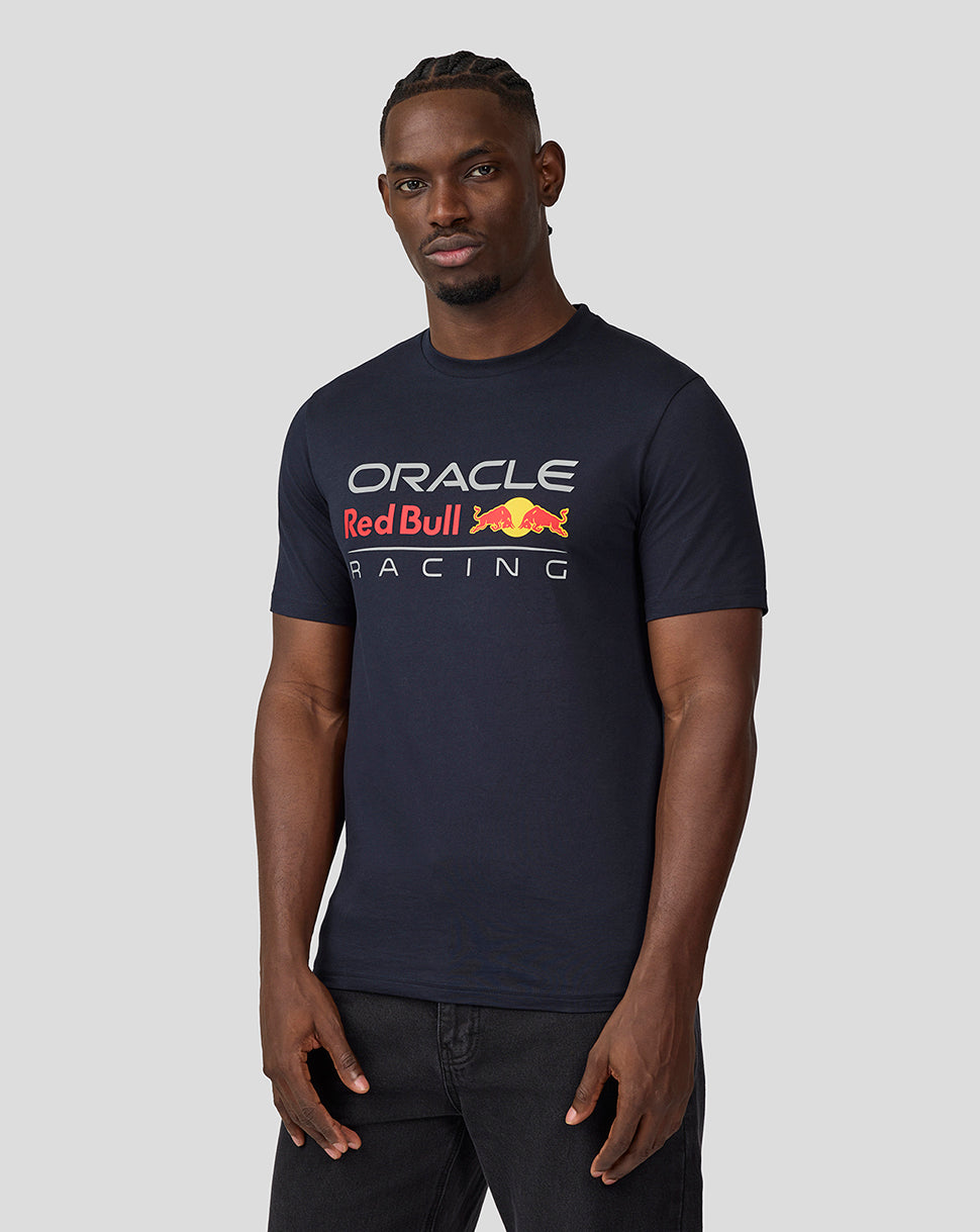 Man wearing navy Oracle Red Bull Racing T Shirt with large front logo