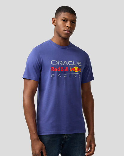 Front view of a male model wearing a blue Oracle Red Bull Racing T-shirt with a large front graphic