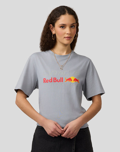 Front view of a woman wearing a light gray Oracle Red Bull Racing Core T-shirt with a large Red Bull graphic on the chest