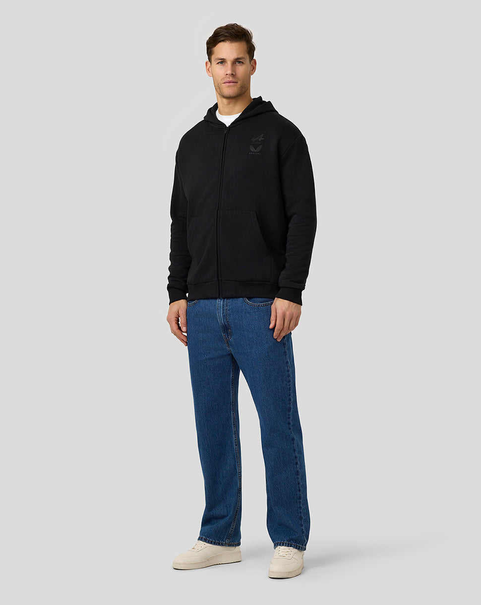Male model wearing a black zip hoodie with front zipper and pockets