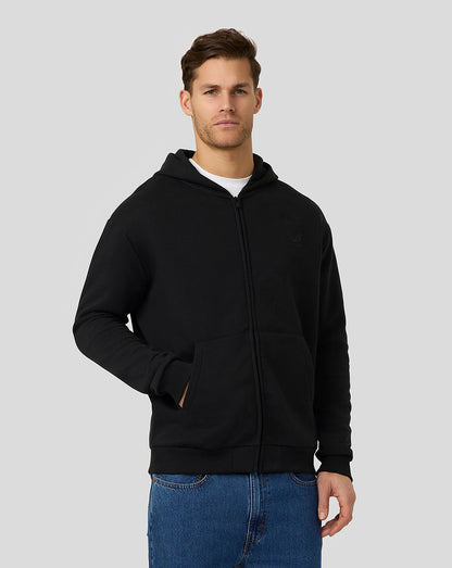 Male model wearing BWT Alpine Formula One Team black on black zipped hoodie with front pockets