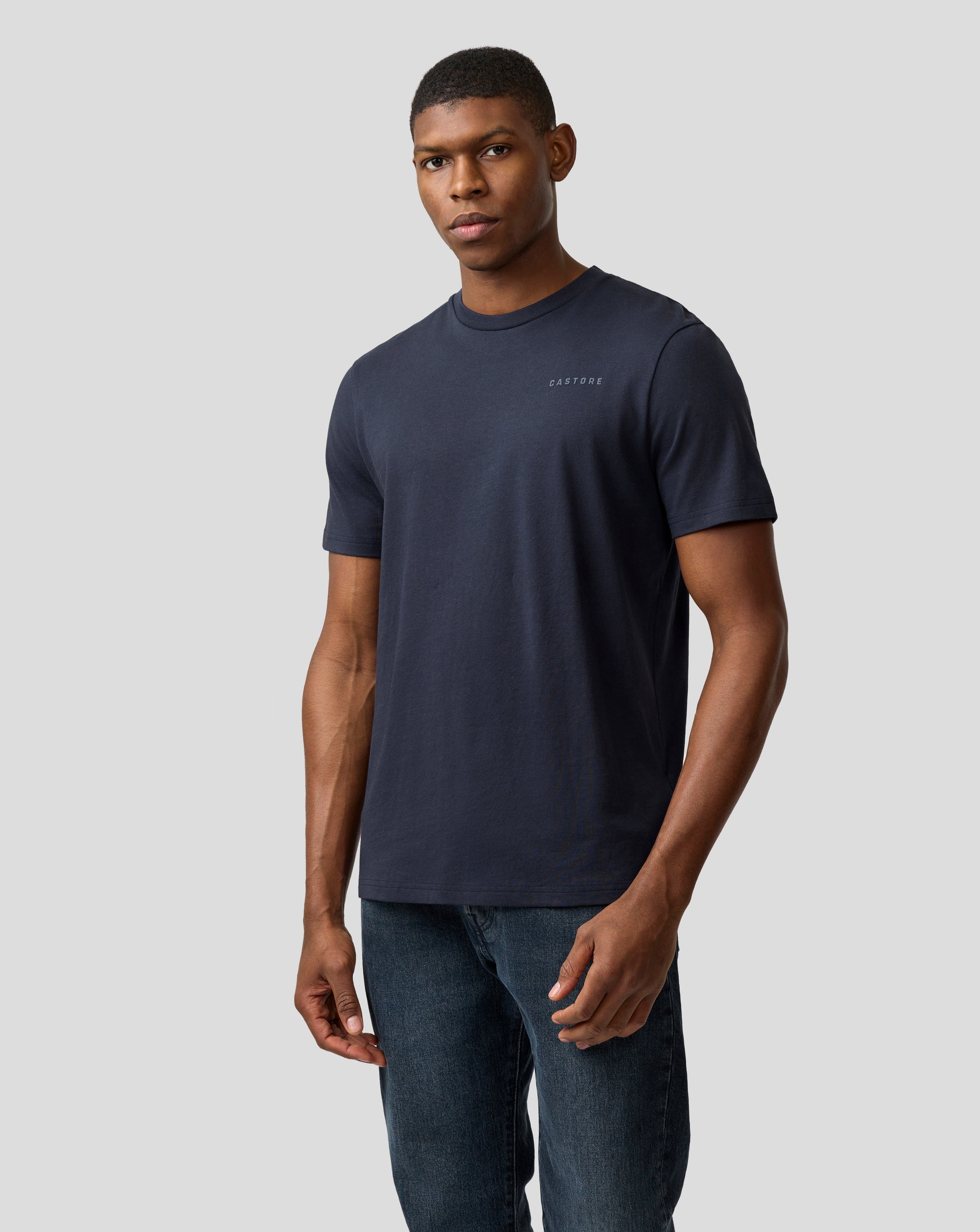 Navy Night Sky Oracle Red Bull Racing unisex regular fit T shirt on a male model with a small chest logo