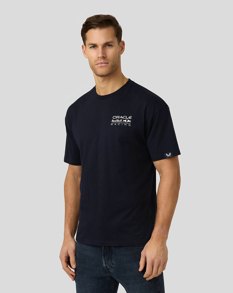 Navy oversized Max Verstappen crest T shirt on a model with a large back graphic and Castore label on the left sleeve