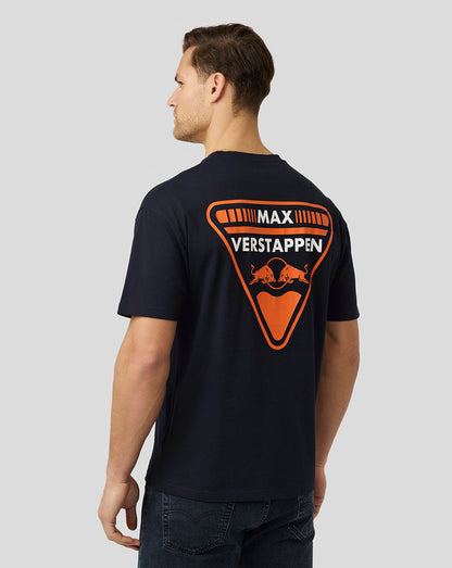Back view of a man wearing a navy oversized Oracle Red Bull Racing T shirt with the orange Verstappen crest graphic.