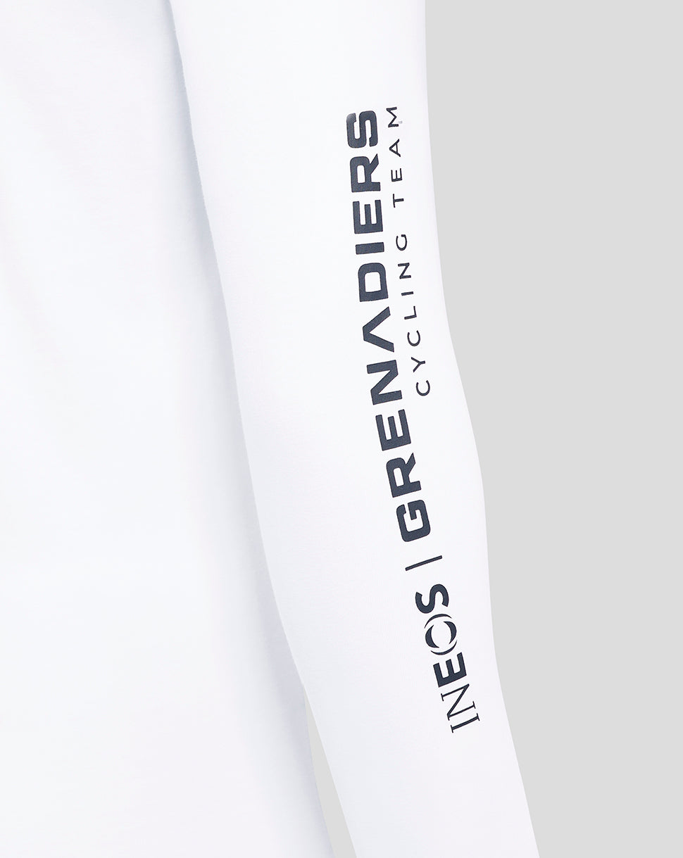 White INEOS Grenadiers long sleeve shirt with vertical navy branding along the sleeve