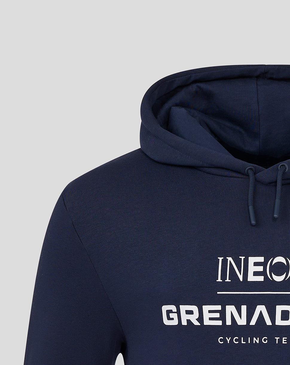 Close-up of navy hoodie showing hood with drawstrings and front INEOS Grenadiers logo.