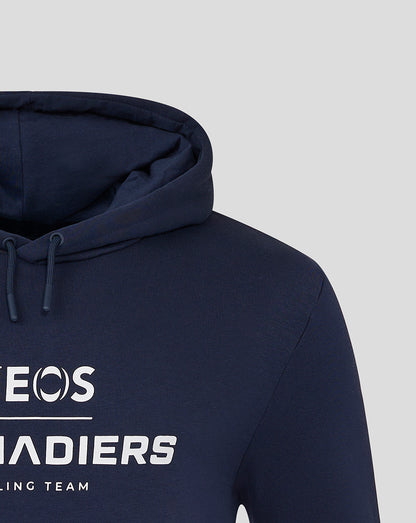Close-up of navy hoodie chest with large INEOS Grenadiers logo and cycling team text.