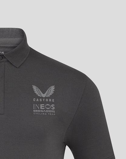 Left chest logo on grey polo displaying Castore and Ineos Grenadiers branding