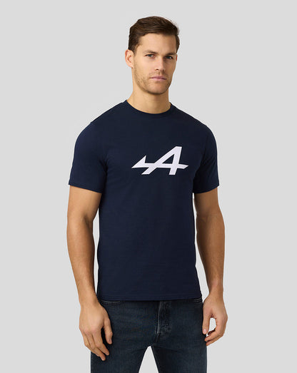 Man wearing a navy Alpine Core Essentials T shirt with a large white Alpine logo on the chest.