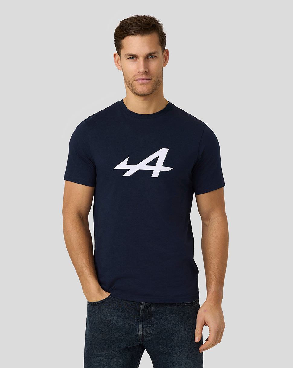 Male model in navy Alpine Core Essentials T-Shirt with large white logo on the chest
