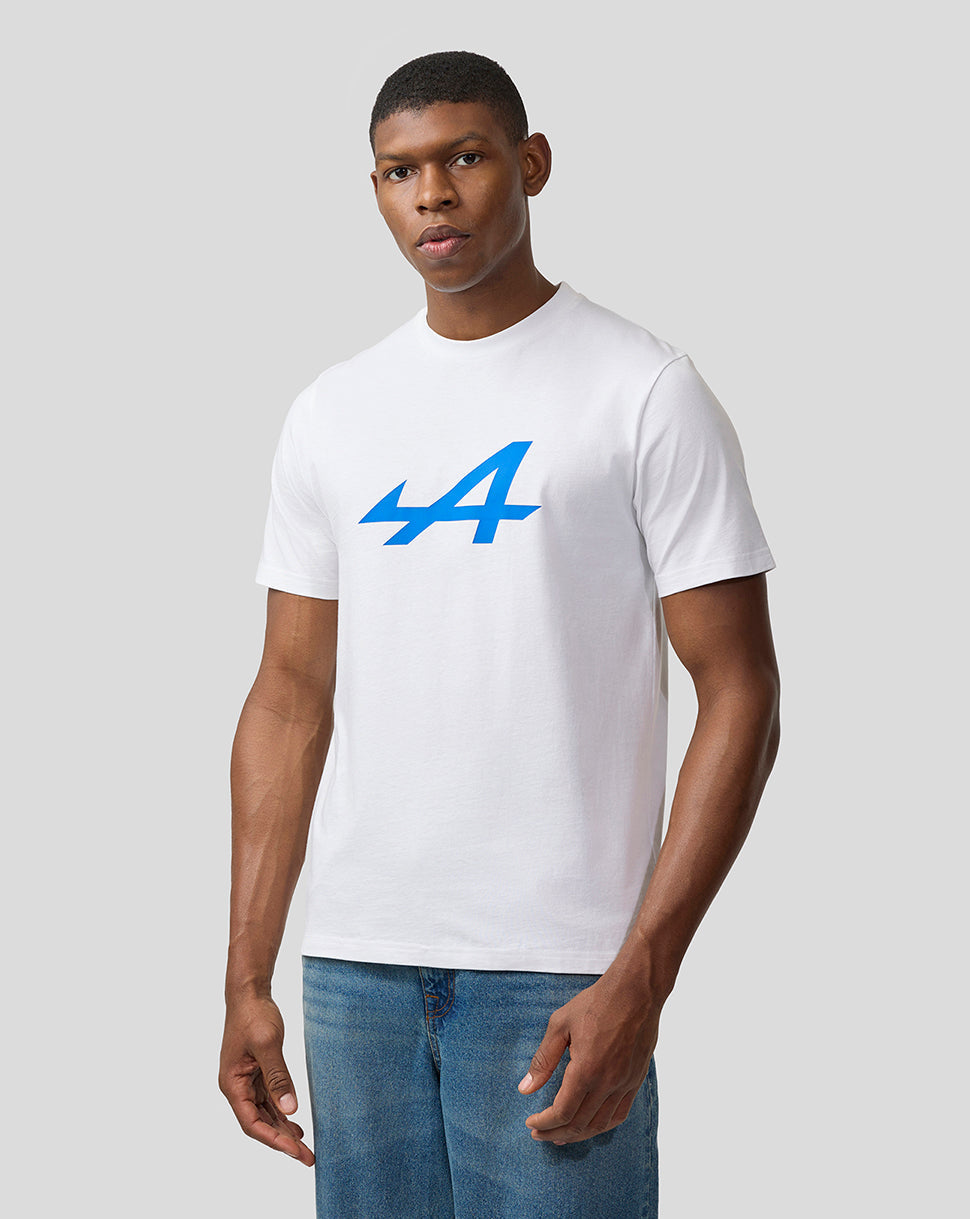 Male model wearing white Alpine Core Essentials T-Shirt with bold blue logo on the chest