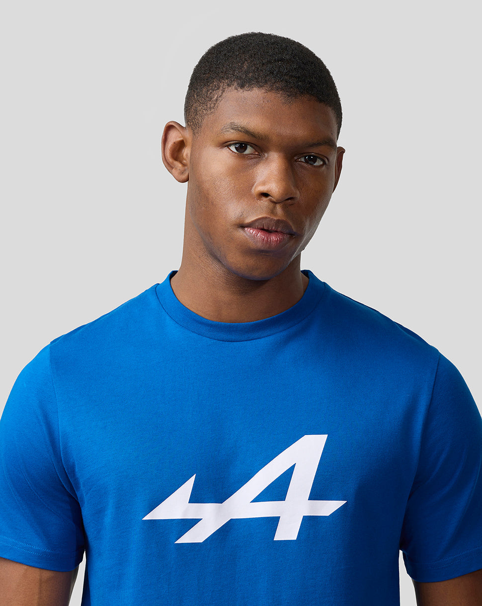 Close-up of a male model in a lapis blue Alpine Core Essentials T-shirt featuring a large white 44 on the front