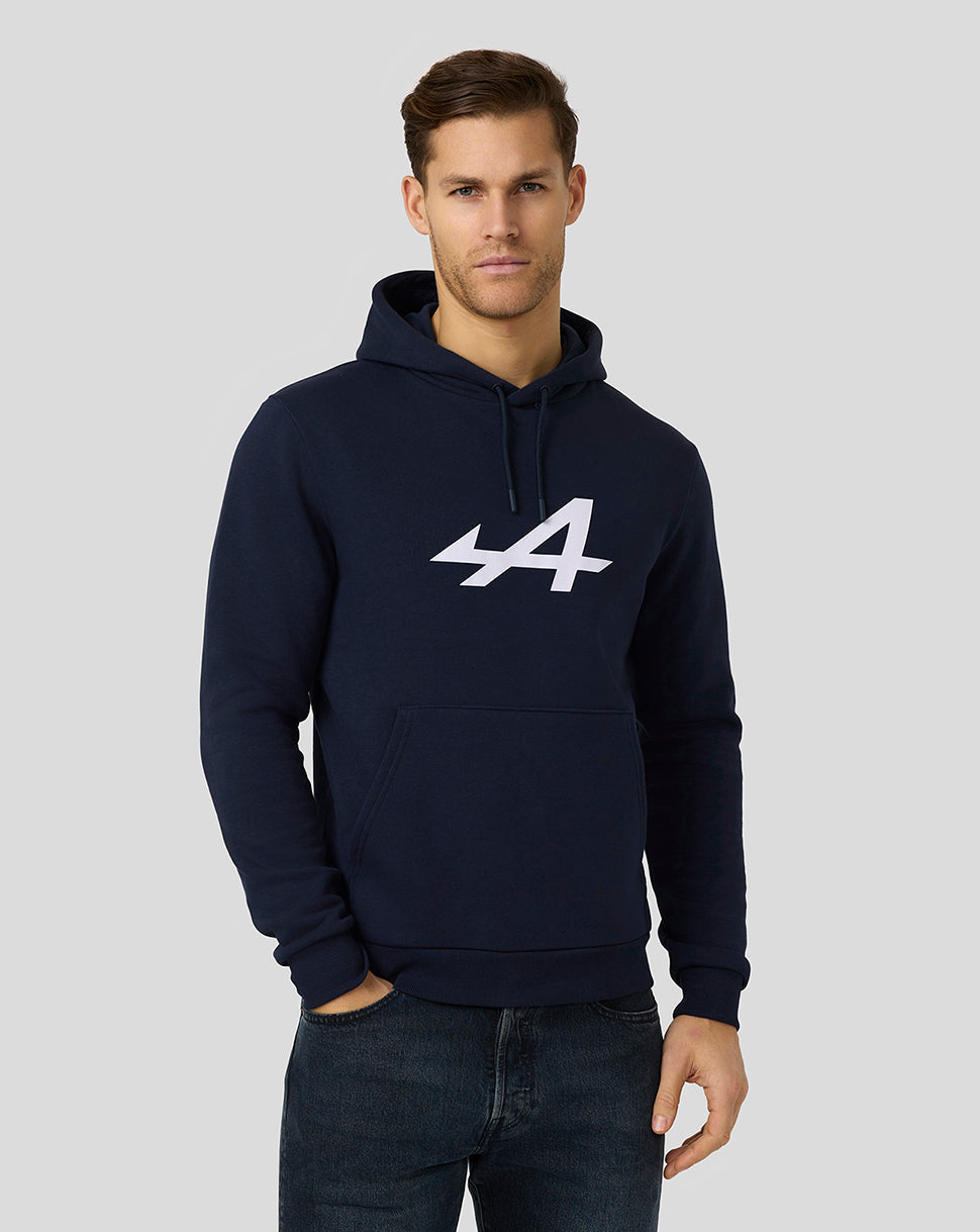 Male model wearing navy Alpine Core Essentials Hoodie with a large white 44 logo on the chest and a front kangaroo pocket