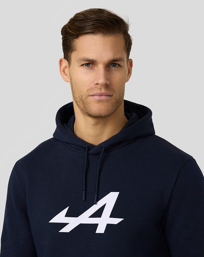 Man wearing navy Alpine Core Essentials Hoodie with a prominent white 44 logo on the chest