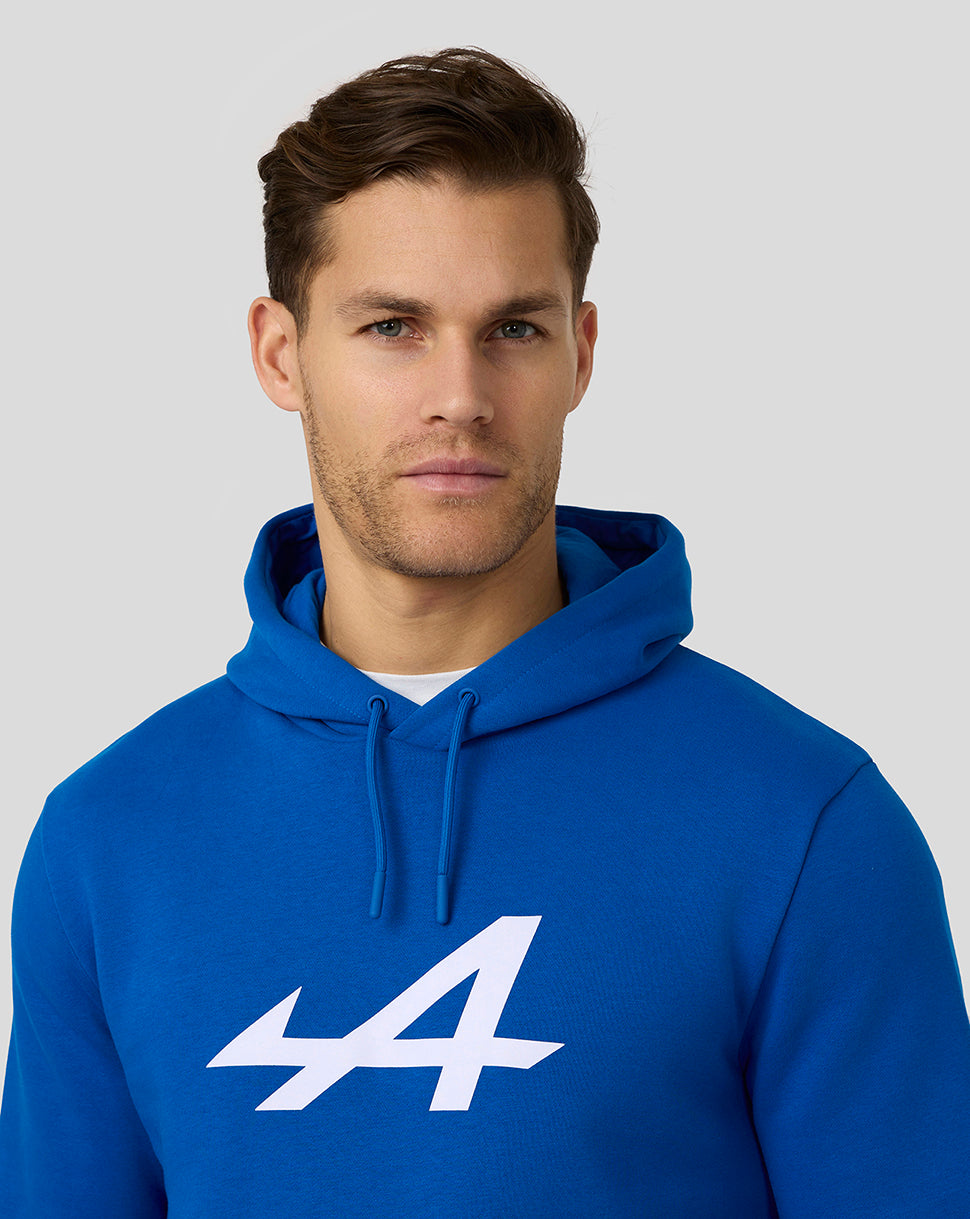 Male model wearing lapis blue Core Essentials Hoodie with a large white 44 graphic on the chest and a drawstring hood