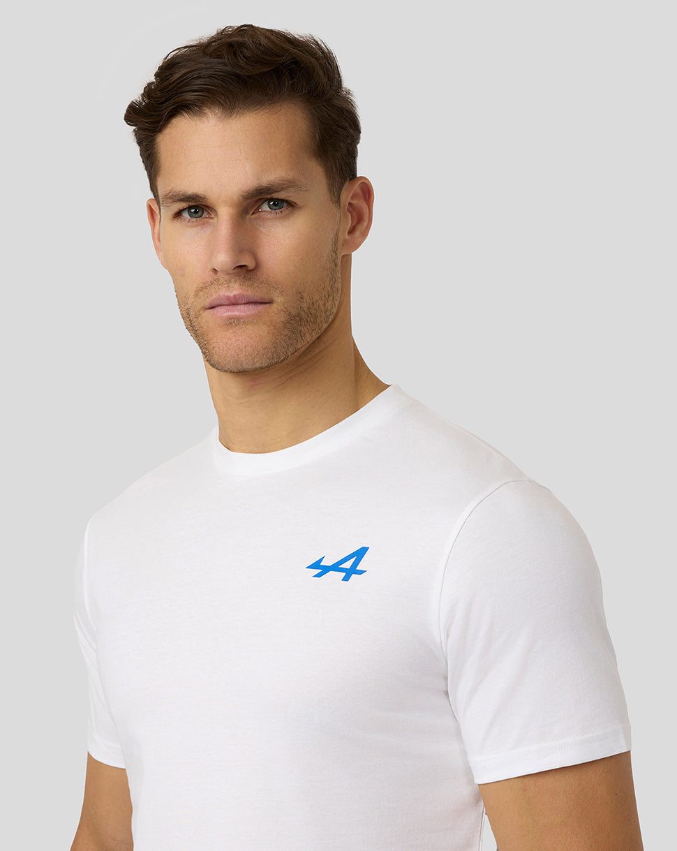 Front view of a man wearing a white Alpine graphic T-shirt with a small blue logo on the left chest.