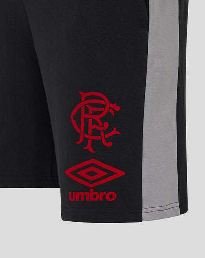 Close up of Rangers Travel Shorts in black with a red Umbro logo on the leg and a grey side panel.
