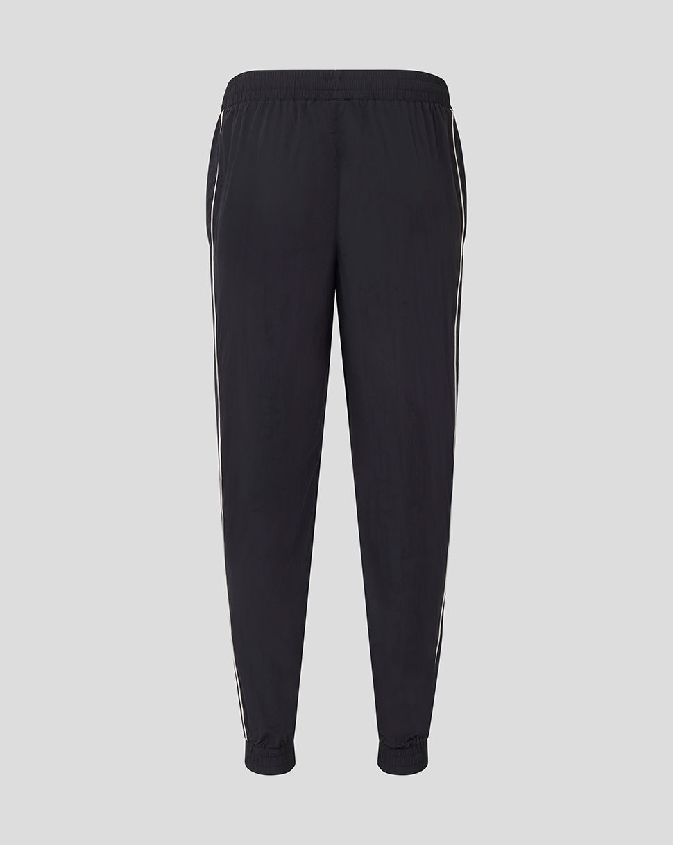 Back view of black Rangers travel pant with white side stripes and elasticated waistband