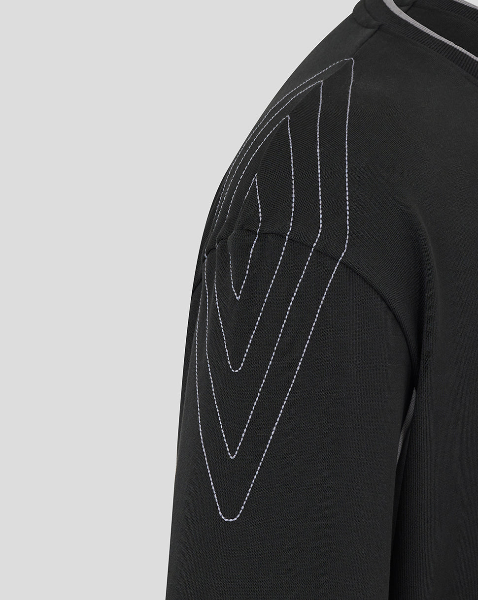 Black Rangers travel hoodie shoulder with white contrast stitching forming geometric panel lines.